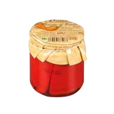 Jar of roasted whole piquillo peppers